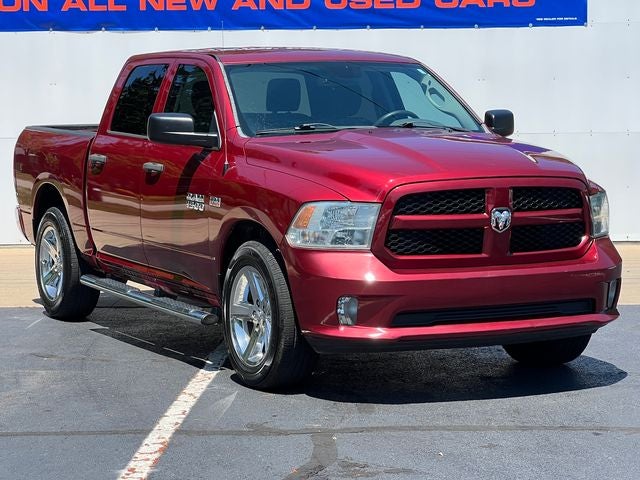 2015 RAM 1500 Express in Deep Cherry Red Crystal Pearlcoat — front three-quarter view