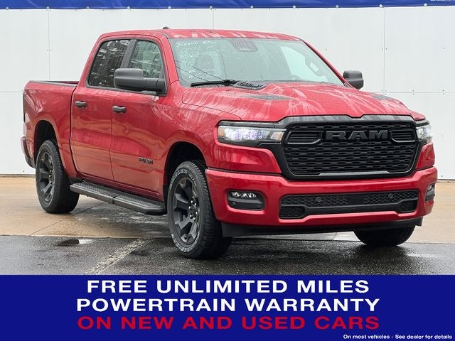 2026 RAM Ram 1500 RAM 1500 EXPRESS CREW CAB 4X4 5'7' BOX in Molten Red Pearl-Coat Exterior Paint — front three-quarter view