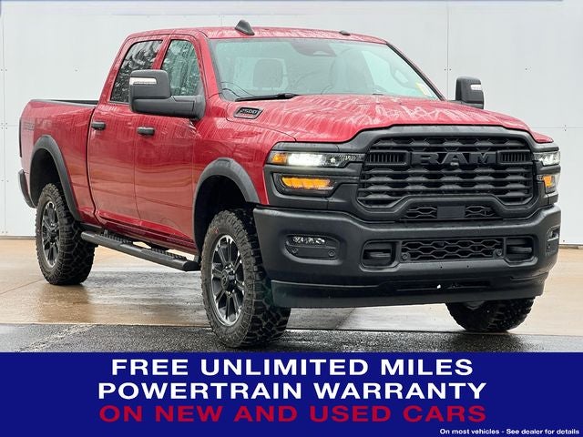 2026 RAM Ram 2500 RAM 2500 WARLOCK CREW CAB 4X4 6'4' BOX in Molten Red Pearl-Coat Exterior Paint — front three-quarter view