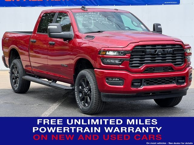 2026 RAM Ram 2500 RAM 2500 BIG HORN CREW CAB 4X4 6'4' BOX in Molten Red Pearl-Coat Exterior Paint — front three-quarter view