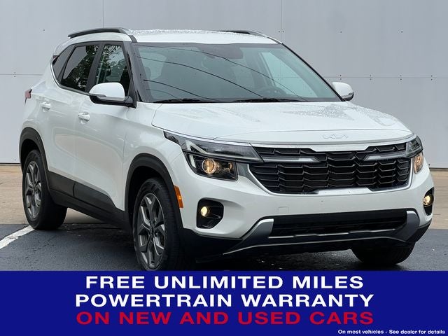 2024 Kia Seltos S in Snow White Pearl — front three-quarter view